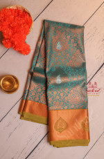 PEACOCK BLUE COLOUR BODY WITH COPPER ZARI FLORAL EMBOSED WITH CONTRAST BLOUSE & BORDER