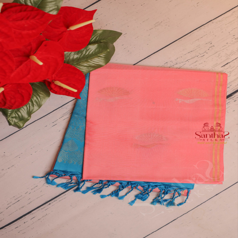 PASTEL PEACH COLOUR BODY WITH GOLDEN ZARI PEACOCK BUTTA WITH CONTRAST BLOUSE & BORDER