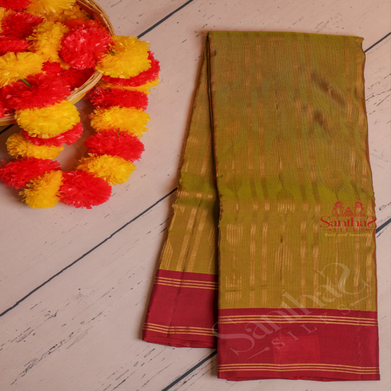 OLIVE GREEN COLOUR BODY WITH GOLDEN ZARI STRIPS WITH CONTRAST BLOUSE & BORDER