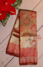 GOLDEN RED COLOUR TISSUE BODY WITH EMBOSED FLORAL PATTERN WITH SELF BLOUSE