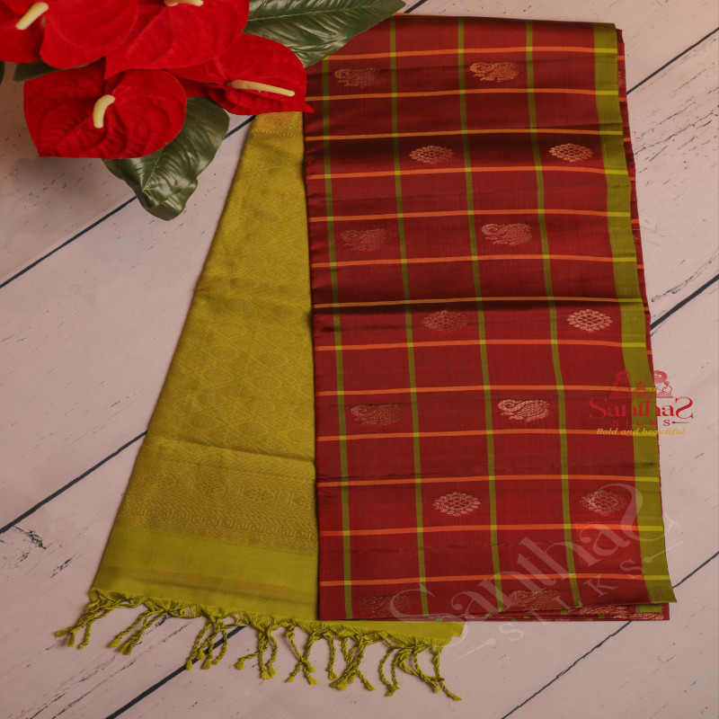 MAROON COLOUR CHECKED BODY WITH GOLDEN ZARI BUTTA WITH CONTRAST BLOUSE & BORDER