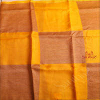  KORA TISSUE SAREE IN MUSTARD COLOUR