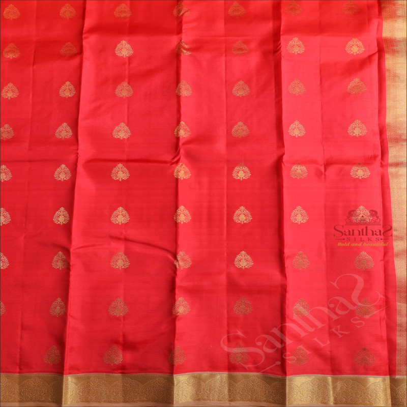 CORAL RED COLOUR BODY WITH GOLDEN ZARI BUTTAS AND CONTRAST PALLU & BLOUSE