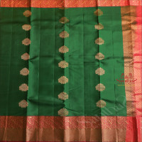 BOTTLE GREEN COLOUR BODY WITH GOLDEN ZARI FLORAL BUTTA WITH CONTRAST BLOUSE & BORDER