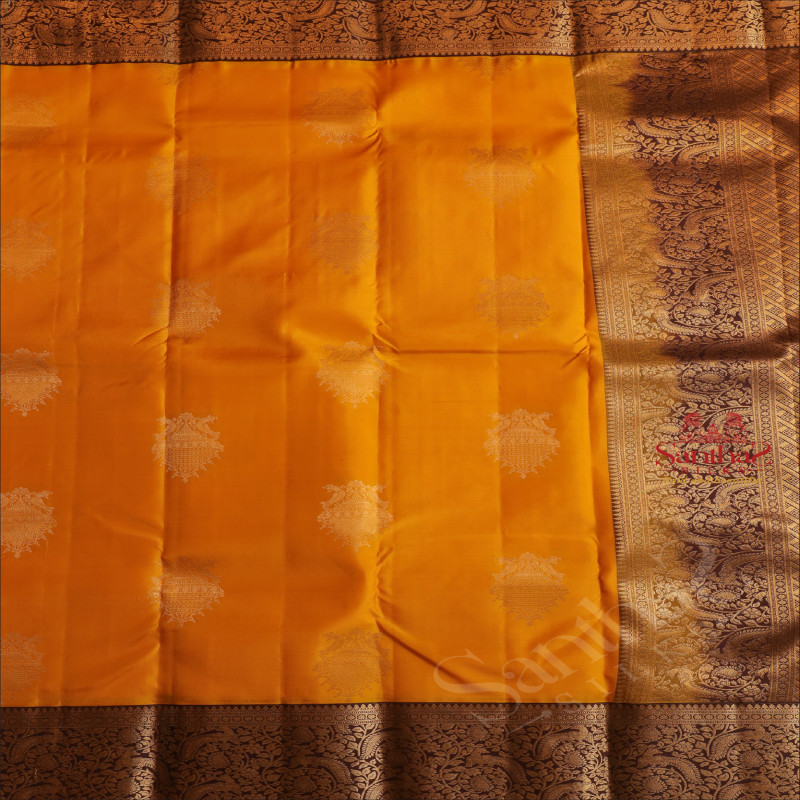 MUSTARD YELLOW COLOUR BODY WITH GOLDEN ZARI PARROT MOTIFS AND CONTRAST PALLU & BLOUSE