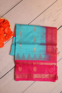 sky-blue-colour-body-with-golden-zari-butta-with-contrast-blouse-border