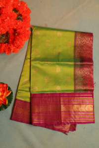 green-colour-body-with-golden-zari-annam-chakkaram-butta-with-contrast-blouse-border