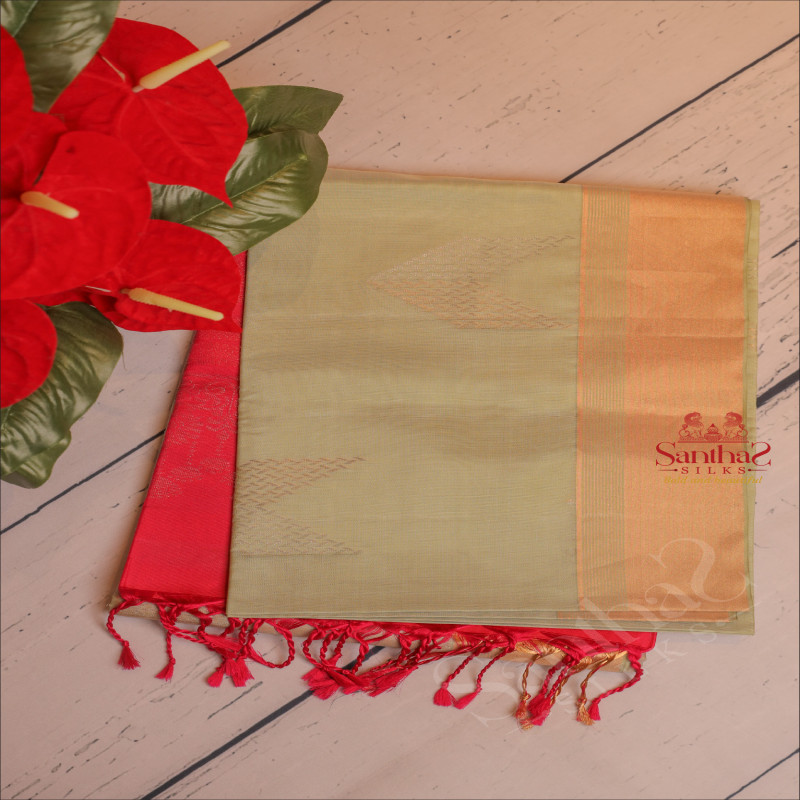 PISTHA GREEN COLOUR BODY WITH COPPER ZARI BUTTA WITH CONTRAST BLOUSE & BORDER