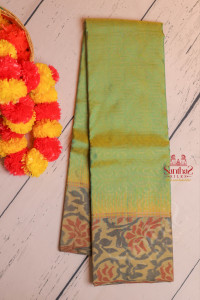 green-colour-body-with-golden-zari-strips-with-contrast-blouse-border