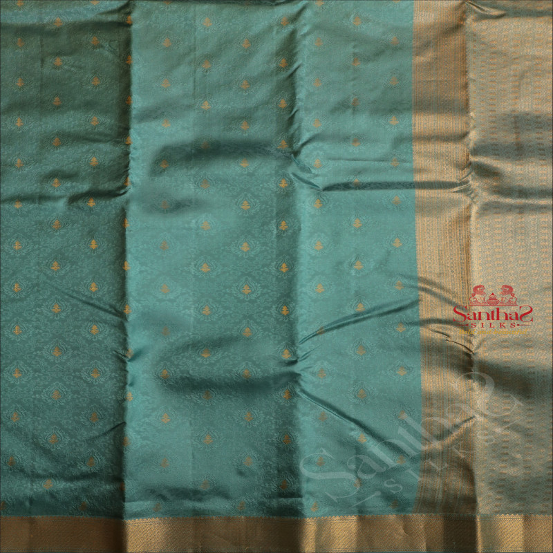 JUNGLE GREEN COLOUR BODY WITH BANARAS EMBOSED DESIGN AND SELF COLOUR PALLU & BLOUSE