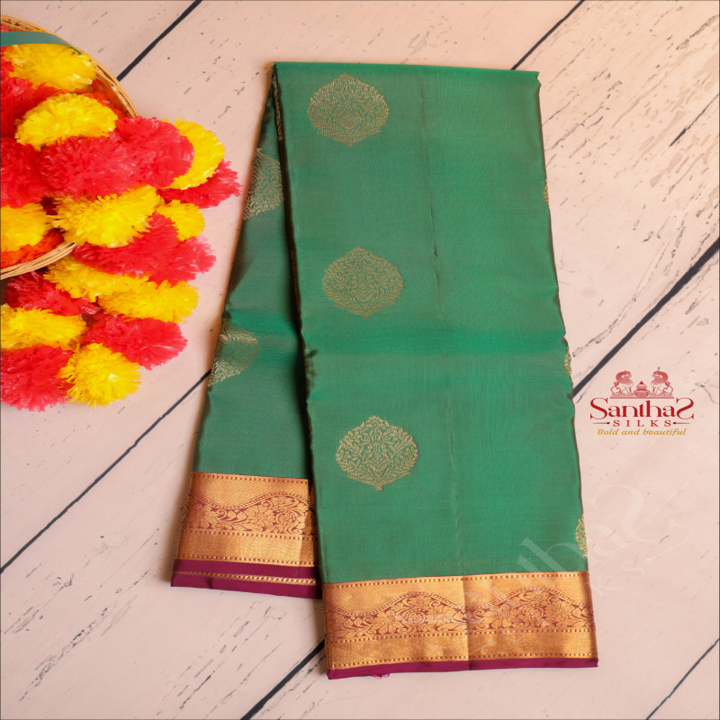 GREEN COLOUR BODY WITH GOLDERN ZARI BUTTA WITH CONTRAST BLOUSE & BORDER
