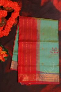 blue-colour-body-with-golden-zari-butta-with-contrast-blouse-border