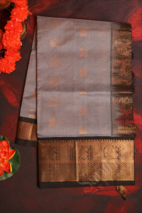 grey-colour-body-with-golden-zari-annam-butta-with-contrast-blouse-border