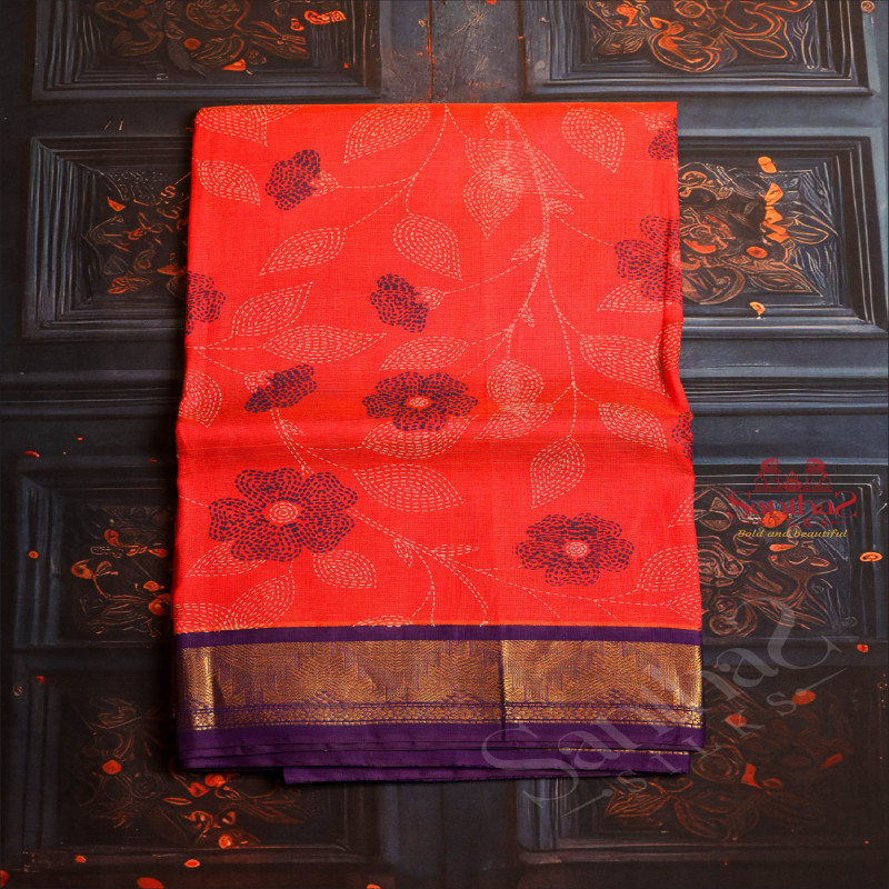 ORANGE COLOUR BODY WITH FLORAL PATTERN EMBOSED WITH CONTRAST BLOUSE & BORDER