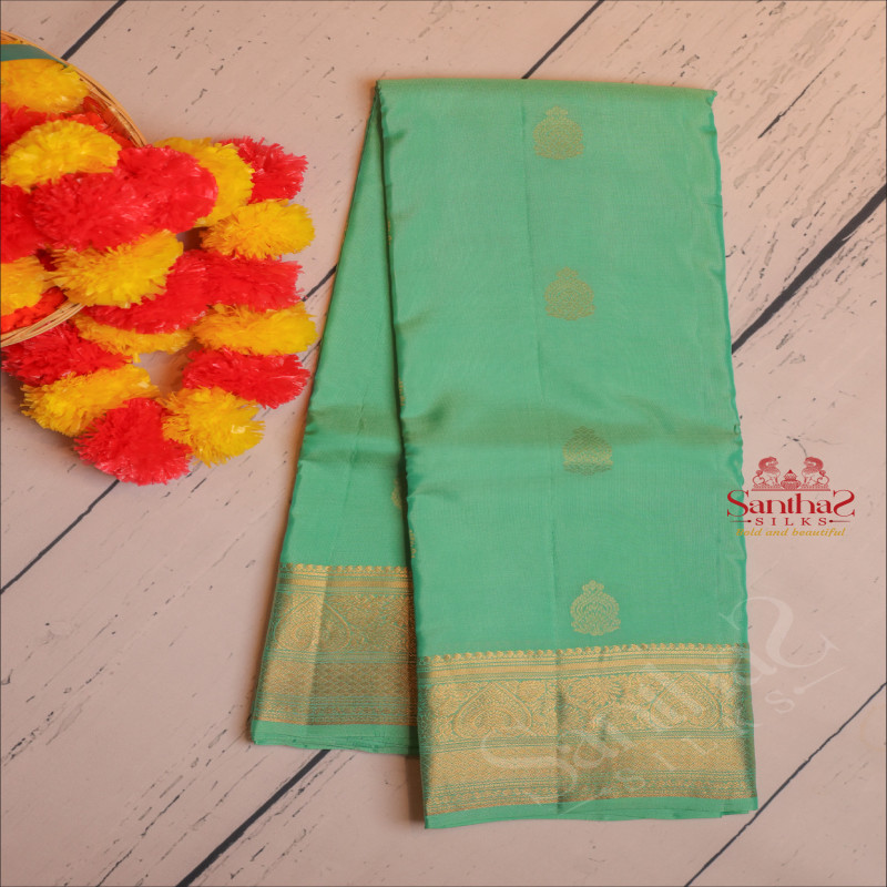 PASTEL GREEN COLOUR BODY WITH GOLDEN ZARI BUTTA WITH SELF BLOUSE
