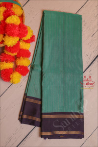 blue-colour-body-with-golden-zari-strips-with-contrast-blouse-border