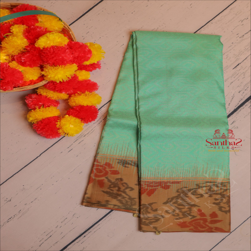 MEDIUM AQUAMARINE BLUE COLOUR BODY WITH GOLDEN ZARI EMBOSED WITH CONTRAST BLOUSE & BORDER