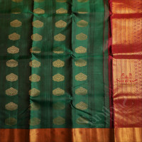 FOREST GREEN COLOUR BODY WITH GOLDEN ZARI MOTIFS & EMBOSED DESIGN AND CONTRAST PALLU & BLOUSE