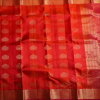 ORANGE COLOUR BODY WITH GOLDEN ZARI BUTTA & EMBOSED DESIGN AND CONTRAST PALLU & BLOUSE