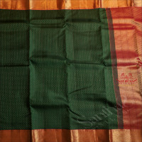 DARK GREEN COLOUR BODY WITH EMBOSED THOUSAND BUTTAS AND CONTRAST PALLU & BLOUSE