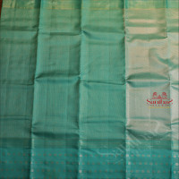 BRIGHT TURQUOSE BLUE COLOUR BODY WITH GOLDEN ZARI SMALL CHECKS AND SELF COLOUR PALLU & BLOUSE