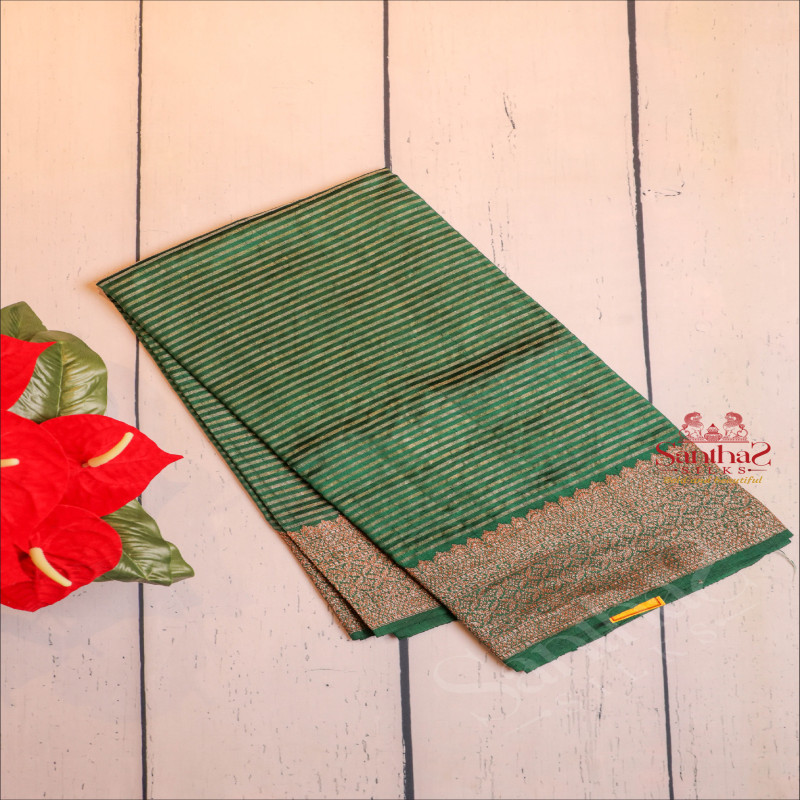 DARK GREEN COLOUR RAW SILK SAREE BODY WITH GOLDEN & SILVER ZARI STRIPS AND SELF COLOUR PALLU & BLOUSE