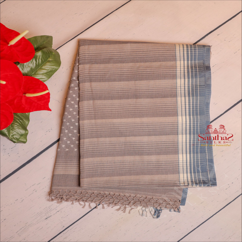 GREY COLOUR COTTON SAREE BODY WITH STRIPS AND SELF COLOUR PALLU WITH WHITE THREAD BUTTAS & BLOUSE