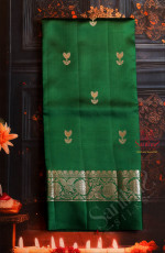  RAW MANGO SAREE IN BOTTLE GREEN COLOUR WITH ZARI BUTTA WITH CONTRAST BLOUSE