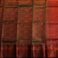 GREEN COLOUR BODY WITH JACQUARD FLORAL EMBOSED WITH CONTRAST MAROON BLOUSE & BORDER