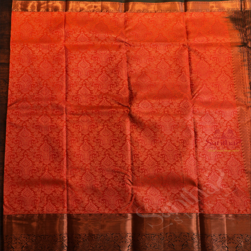 DARK RED COLOUR BODY WITH JACQUARD FLORAL EMBOSED IN COPPER ZARI WITH CONTRAST BLOUSE & BORDER