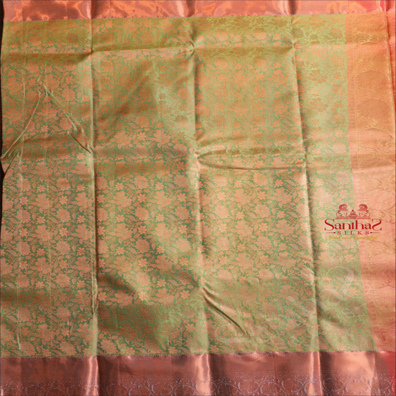 ELACHI GREEN COLOUR BODY WITH JACQUARD FLORAL EMBOSED WITH CONTRAST BLOUSE & BORDER