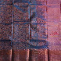 BLUE COLOUR BODY WITH JACQUARD FLORAL EMBOSED IN COPPER ZARI WITH CONTRAST BLOUSE & BORDER