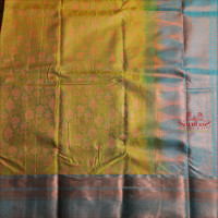 GREEN LIZARD COLOUR BODY WITH JACQUARD FLORAL EMBOSED WITH CONTRAST BLOUSE & BORDER