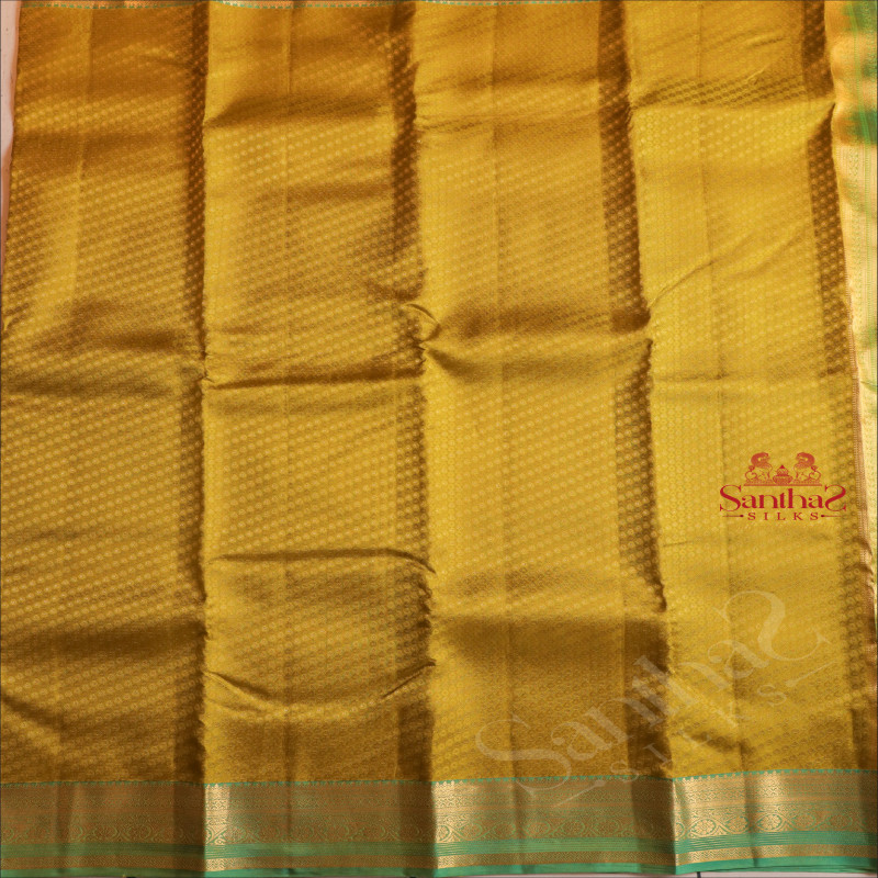 MUSTARD COLOUR BODY WITH EMBOSED DESIGN AND CONTRAST PALLU & BLOUSE