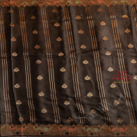 BLACK COLOUR SATIN BANARAS SAREE WITH ZARI FLORAL BUTTA AND PEACOCK ZARI MOTIF WITH SELF BLOUSE