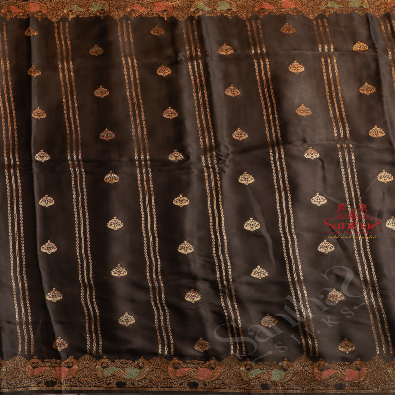 BLACK COLOUR SATIN BANARAS SAREE WITH ZARI FLORAL BUTTA AND PEACOCK ZARI MOTIF WITH SELF BLOUSE
