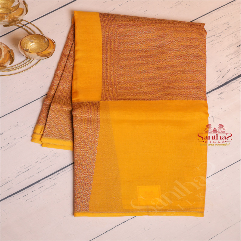  KORA TISSUE SAREE IN MUSTARD COLOUR