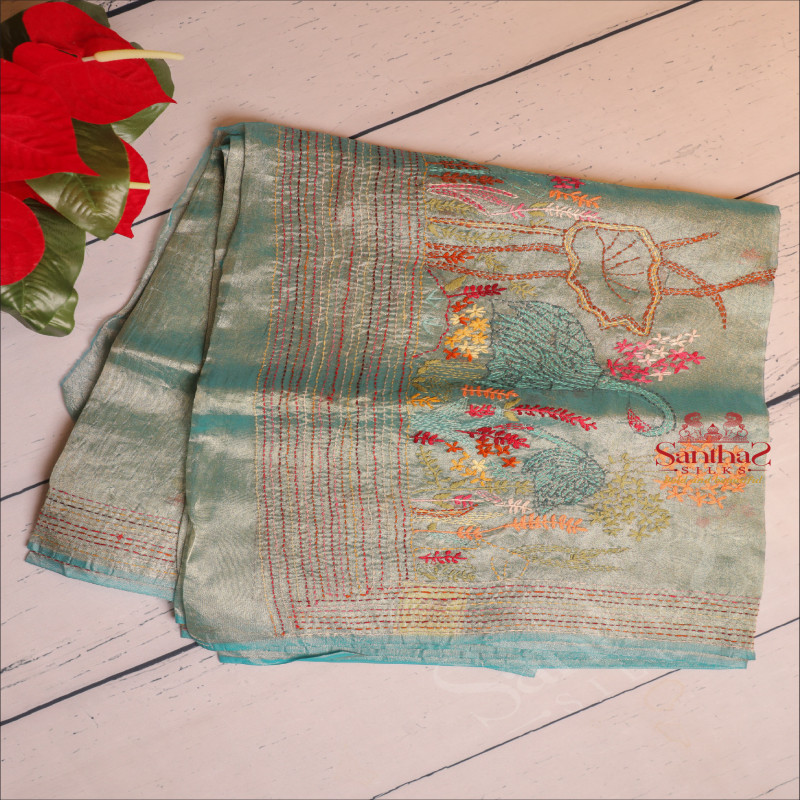  TISSUE SAREE WITH HAND EMBORIDERY WORK IN TEAL GREEN & GOLDEN COLOUR MIXED