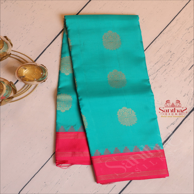 OCEAN BLUE COLOUR BODY WITH GOLDEN ZARI BIG BUTTA WITH CONTRAST BLOUSE & BORDER