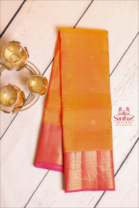 mango-yellow-colour-body-with-golden-zari-buttas-and-contrast-pallu-blouse