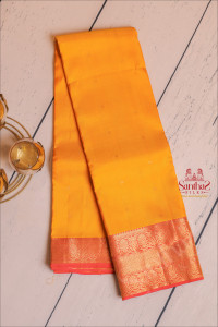 yellow-colour-body-with-golden-zari-buttas-and-contrast-pallu-blouse