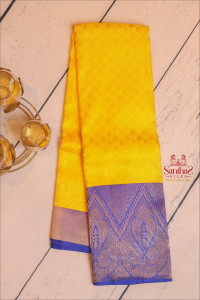 bright-yellow-colour-body-with-golden-zari-buttas-and-contrast-pallu-blouse