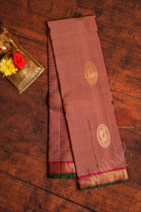 rosy-brown-colour-body-with-golden-zari-peacock-motifs-in-chakra-and-contrast-pallu-blouse