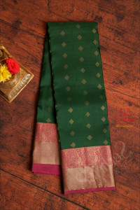 dark-green-colour-body-with-golden-zari-buttas-and-contrast-pallu-blouse