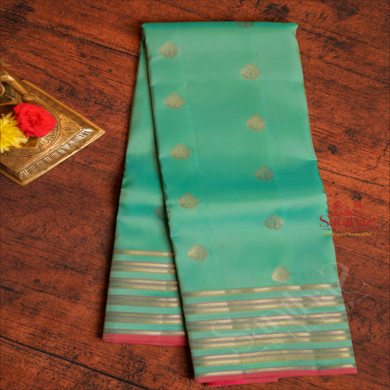 AQUA GREEN COLOUR BODY WITH GOLDEN ZARI BUTTAS AND SELF COLOUR PALLU & BLOUSE