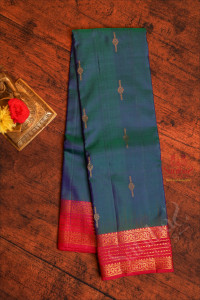 peacock-blue-colour-body-with-golden-zari-buttas-and-contrast-pallu-blouse