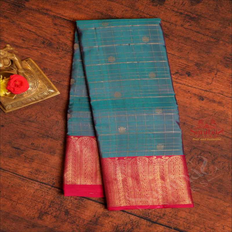 OCEAN BLUE COLOUR CHECKED BODY WITH ZARI BUTTA WITH CONTRAST BLOUSE & BORDER