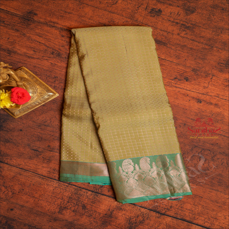 PISTHA GREEN COLOUR CHECKED BODY WITH CONTRAST BLOUSE & BORDER