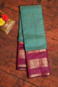 jade-green-colour-body-with-golden-zari-vaira-oosi-pattern-strips-and-contrast-pallu-blouse