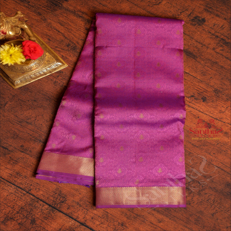 PURPLE COLOUR BODY WITH BANARAS EMBOSED DESIGN AND SELF COLOUR PALLU & BLOUSE